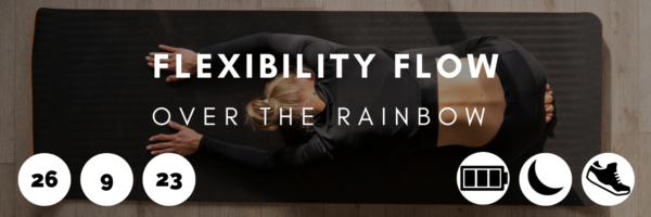 A woman in child's pose to represent the flexibility flow that is happening at Over the Rainbow