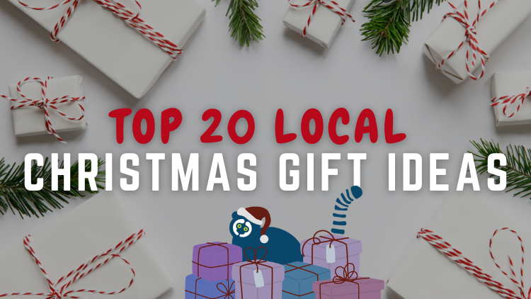 A banner for Tip n' Tag's Weekender post with gifts wrapped in white and candy cane ribbons with a few tree leafs in between with the title " Top 20 Local Christmas Gift Ideas" and a lemur wearing a christmas hat with gifts around him at the bottom